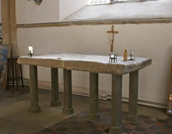 The mediaeval mensa or altar in place following restoration